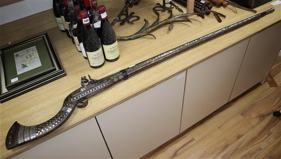 An Indo-Persian mother of pearl inlaid flintlock musket, length 166cm